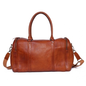 Vintage Leather Duffle Bag Handmade Travel Overnight Bag for Men and Women With Adjustable Shoulder Strap - Product Image 1