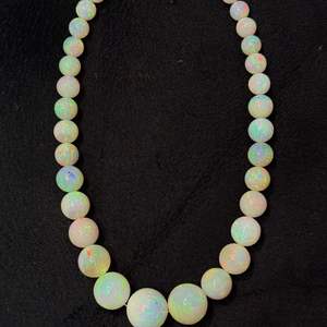 Perles rondes lisses en opale naturelle éthiopienne de 10 mm à 20 mm, de haute qualité, couleur arc-en-ciel, pour la fabrication de bijoux - Product Image 1