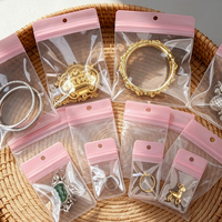 Sachets Ziplock en EVA rose avec trou de suspension, prêts à l'emploi, réutilisables et auto-scellants pour le rangement des boucles d'oreilles, colliers et bagues