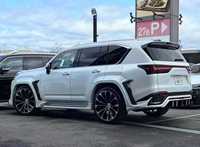 Kit carrosserie large en fibre de verre style Yicku WD pour Lexus LX600 : Lame avant, jupes latérales, diffuseur arrière, aileron et extension d'ailes