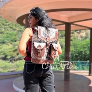 Nouvel arrivage de sac à dos en cuir de vachette avec cheveux usinés à la main de style occidental sac à dos durable en cuir véritable de haute qualité pour femmes - Product Image 1