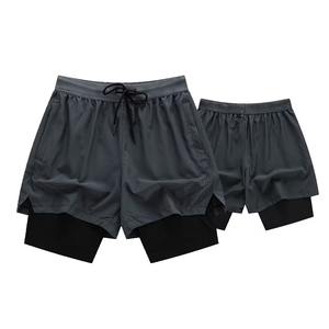 Pantalones cortos de entrenamiento atléticos de poliéster 100% personalizados para hombre, cómodos pantalones cortos de baloncesto para gimnasio, cintura elástica, 6XL, Fitness, informal, sólido - Product Image 3