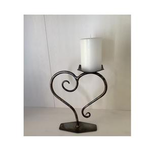 Modern metal candle tealight holder formed to provide warm steady glow and enhance comforting settings in living areas - Product Image 4