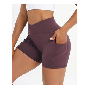 Pantalones cortos de yoga para mujer de calidad premium Material elástico de alta calificación con bolsillos laterales Patrón sólido Top de Yoga de la mejor calidad - Product Image 1