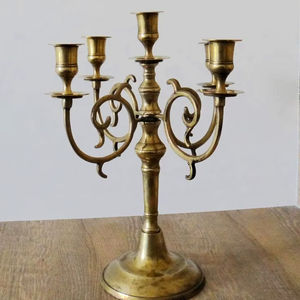 <b>Gold</b> vintage-style tulip <b>candle</b> stands with green twisted <b>candles</b>. Available at wholesale prices. - Product Image 1