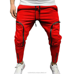 Pantalones Harem informales de estilo Hip Hop para hombre, color sólido con múltiples bolsillos con cremallera y cordón frontal plano, ropa de calle a la moda - Product Image 1