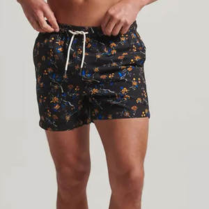 Shorts de Baño Personalizados para Hombre, Diseño Tropical Floral Negro, Secado Rápido, Ecológicos e Impermeables - Product Image 1