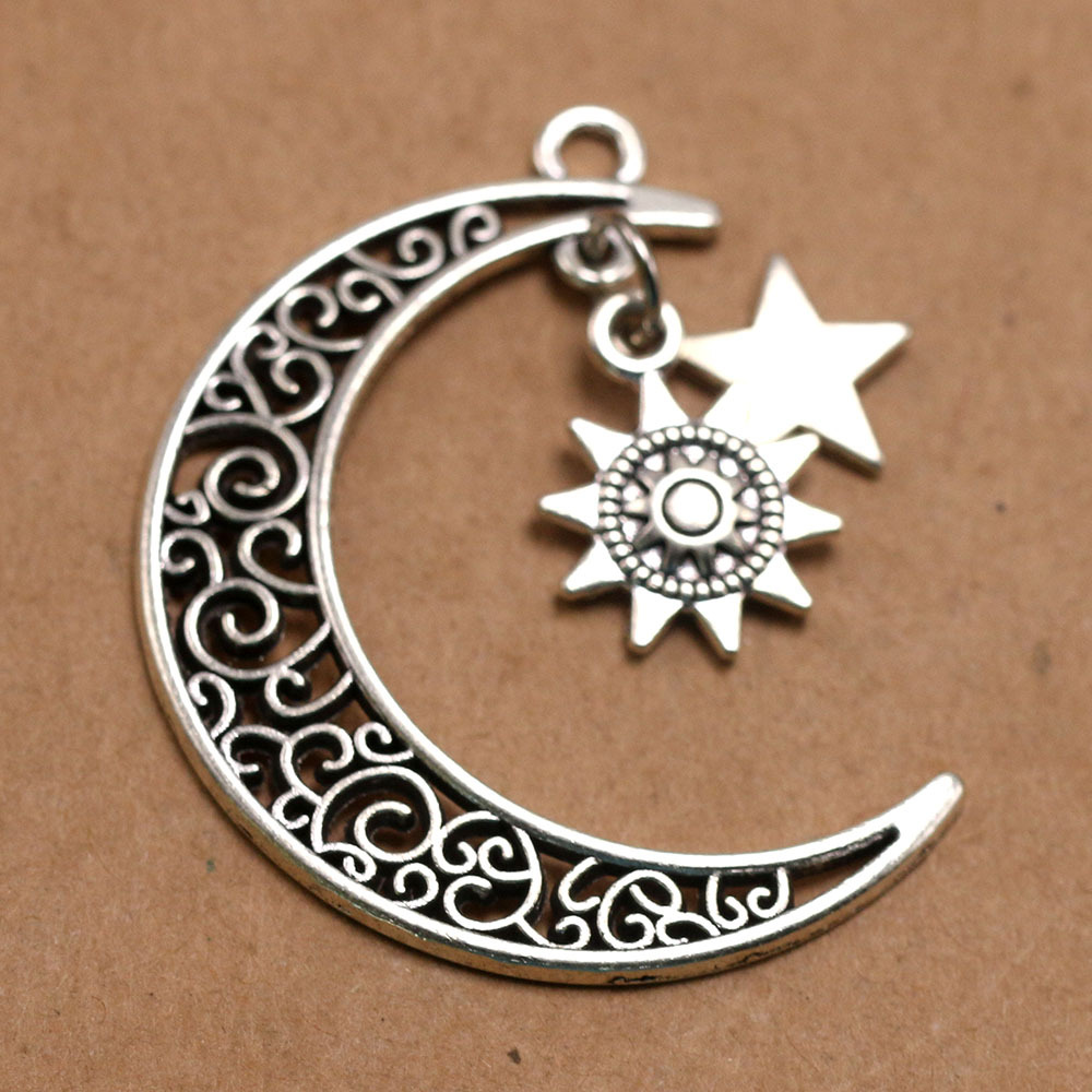 Lune et étoiles et soleil couleur argent antique plaqué