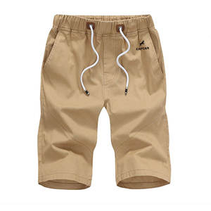 2024กางเกงขาสั้นผ้าฝ้ายใส่สบายสำหรับผู้ชายเอวสูงสไตล์สตรีทดีไซน์สีทึบพร้อมกระเป๋าข้าง2ข้าง - Product Image 1