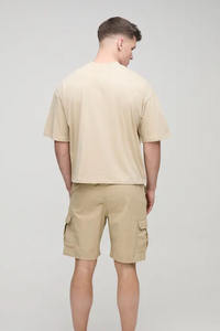 กางเกงขาสั้นผู้ชาย ผ้าฝ้าย 100% ไม่ถักทอ น้ำหนักปานกลาง แห้งเร็ว ทรงทันสมัย ใส่สบายในฤดูร้อน ระบายอากาศได้ดี เหมาะสำหรับออกกำลังกายและกิจกรรมกลางแจ้ง - Product Image 4