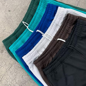 กางเกงขาสั้นผ้าโพลีเอสเตอร์สองชั้นเป็นมิตรกับสิ่งแวดล้อมผ้าเมชเอวยางยืดโอเวอร์ไซส์สำหรับผู้ชายแบบเรียบง่าย220gsm ออกแบบได้ตามต้องการ - Product Image 3