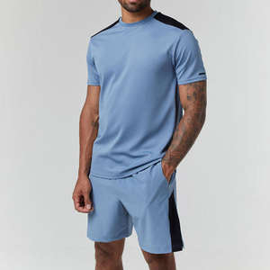 Camiseta y conjunto corto para hombre, chándal de verano de 2 piezas para hombre, conjunto de estancia de dos tonos de manga corta a la moda, conjunto de ropa de resort para hombre - Product Image 1