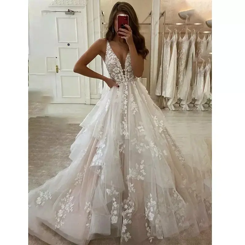 A-Line Princess Tulle V-neck Sleeveless Applique Sweep Brush Train Wedding Dresses Ruffles Bride's Wedding Gowns