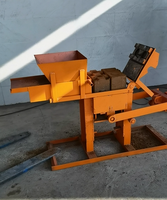Machine manuelle de fabrication de briques solides Machine manuelle de moulage de briques de pavage à emboîtement d'argile