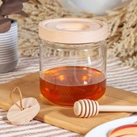 Venta caliente tarro de miel soporte de contenedor de vidrio con tapa de acacia de madera y cucharón tarro de almacenamiento de alimentos de vidrio de alta calidad con tapa