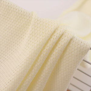 Alta calidad 100% algodón 32S tejido Jacquard agujero sólido Jersey tela transpirable estilo liso para ropa de bebé tela de punto - Product Image 5