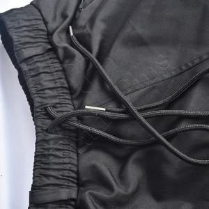 Logo personnalisé Pantalon cargo en polyester léger de couleur unie à taille élastique Pantalon de ski de snowboard imperméable et respirant pour l'hiver - Product Image 3