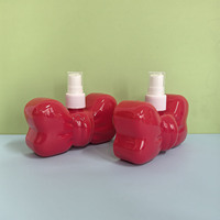 Bouteille de pulvérisation de brouillard d'alcool en plastique en forme d'arc créatif rouge personnalisé 100ml bouteilles de pulvérisation de soins de la peau de corps de visage bouteille de parfum à la maison de voiture