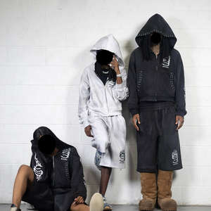 Survêtement unisexe personnalisé style streetwear vintage oversize, effet vieilli et délavé, avec impression sérigraphiée et strass, à cordon de serrage sur toute la longueur - Product Image 2