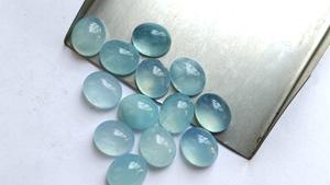 Haute qualité laiteux aigue-marine bleu naturel semi-précieux ovale coupe 6X8mm dos plat Cabochon fabrication de bijoux pierres en gros - Product Image 4