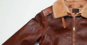 Veste en cuir de haute qualité avec boutons en fausse fourrure et fermeture éclair - Product Image 5