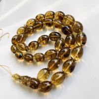Collier artisanal écoresponsable en ambre de la Baltique avec 33 perles d'ambre vertes et insectes, Tasbih musulman, bijoux Amberstone
