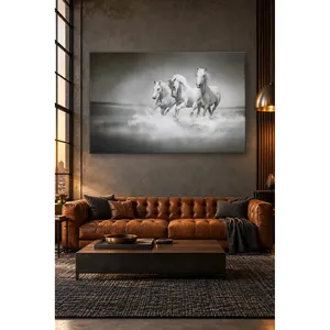 Impression sur toile Fida : Trois chevaux blancs galopant dans l'eau, noir et blanc - Product Image 1