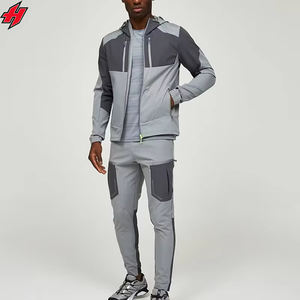 Ropa de calle cortavientos de retazos con cremallera, chaqueta de nailon y pantalones de nailon, conjuntos de gimnasio para correr, chándales cortavientos de diseño personalizado - Product Image 1