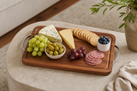 Planche à découper en bois d'acacia avec poignées métalliques et rainure pour les jus, pour servir viande, pain et fromage dans la cuisine