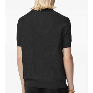 Acabado texturizado negro personalizado para hombre para polo con cierre de botón frontal mangas cortas y logotipo bordado con dobladillo recto - Product Image 3