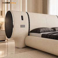 Cadre de lit king-size moderne de luxe en cuir véritable capitonné avec tête de lit ovale capitonnée et prises électriques pour chambre d'hôtel