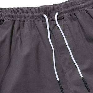 2025 nuevos pantalones ajustados de fábrica para hombre, cómodos, ligeros, ropa de calle para exteriores, estilo frontal plano moderno, teñido liso - Product Image 6