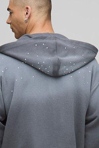 Ensemble de survêtement streetwear en coton mélangé respirant, avec sweat à capuche zippé et pantalon évasé, orné de strass délavés effet soleil, personnalisable par le fournisseur OEM - Product Image 6