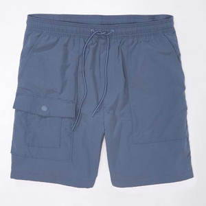 กางเกงขาสั้นไนลอนผู้ชายสำหรับออกกำลังกายน้ำหนักเบากางเกงครึ่งขาสำหรับเล่นกีฬาฤดูร้อนกางเกงขาสั้นคาร์โก้สไตล์ลำลองสีพื้นดีไซน์มาใหม่ - Product Image 1