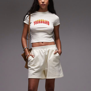 ชุดสองชิ้นผ้าฝ้ายลำลองของผู้หญิงเสื้อยืดน้ำหนักเบา & กางเกงขาสั้นเหนือเข่ายิมกางเกงขาสั้นลายพื้น - Product Image 1