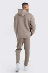 Ensemble pantalon de survêtement et sweat à capuche personnalisés Survêtement baggy évasé en coton vierge surdimensionné et uni de poids lourd pour hommes - Product Image 4
