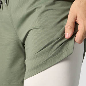 กางเกงขาสั้นผู้ชาย OEM สำหรับฤดูร้อน ทรงพอดีตัว ระบายอากาศได้ดี ผลิตจากผ้าอ๊อกซ์ฟอร์ดแบบไม่ทอ พร้อมบริการพิมพ์โลโก้และผลิตภายใต้แบรนด์ของลูกค้า - Product Image 4