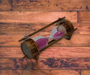 นาฬิกาทรายทองเหลือง 3 นาทีพร้อมเข็มทิศตั้งเวลาทั้งสองด้านพร้อมนาฬิกาทรายสีม่วงประกายตกแต่งบนโต๊ะนาฬิกาทราย - Product Image 2