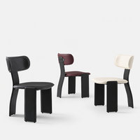 Chaise de salle à manger minimaliste de style italien en cuir pleine fleur avec capacité de charge de 500 kg, siège rembourré doux, design moderne pour la maison et l'hôtellerie