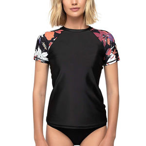 Rash Guard respirant avec impression de logo personnalisé pour les femmes MMA Shorts Sleeve Fitness Ladies Compression Shirts Service OEM - Product Image 1
