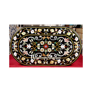 Mesa de diseño con incrustaciones de flores de forma ovalada pulida de primera clase para decoración de Hotel, buen bloqueo, atractivas mesas de mármol negro - Product Image 1