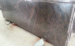 Dalles de granit en peau de tigre de qualité supérieure Conceptions intérieures personnalisées exquises pour comptoirs et revêtements de sol modernes Pierre de grande dalle polie - Product Image 3