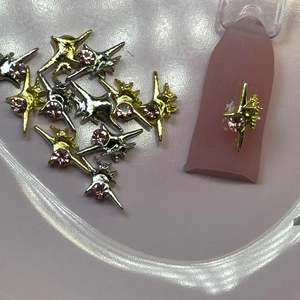 A10jet 10pz Decorazioni per Unghie a Stella a 4 Punte Oro e Argento con Accenti di Diamanti Rosa Forniture per Unghie - Product Image 1