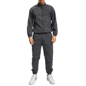 Ropa deportiva personalizada para hombre, chándal ligero de nailon 100% con bolsillos, cortavientos de Color sólido bordado con logotipo OEM - Product Image 6