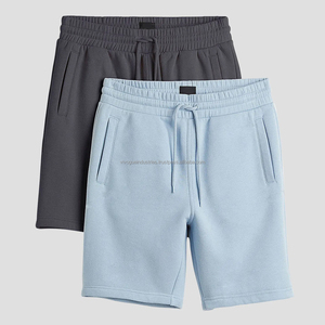 Shorts en jean bleu délavé et déchiré style streetwear pour homme, coupe slim, taille élastique, séchage rapide, 100% coton uni - Product Image 2