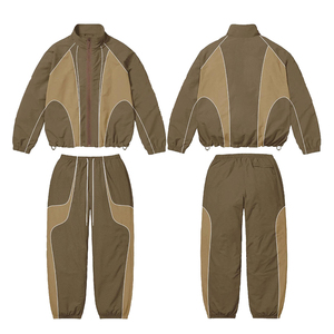 Venta al por mayor chándal cortavientos de nailon personalizado transpirable 100% poliéster Jogger Wear invierno Zip conjuntos a prueba de viento Patchwork Color - Product Image 2