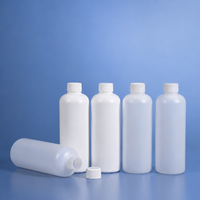 Bouteille ronde en HDPE de 500 ml avec bouchon à vis, doublure en aluminium et mousse, sérigraphiée, anti-corrosion, pour emballage de produits chimiques liquides