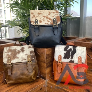 2025 nouveauté véritable peau de vache fourrure cuir sac à dos Style occidental unisexe 2-en-1 multi-usage sac d'école en gros en vrac sacs à la mode - Product Image 1