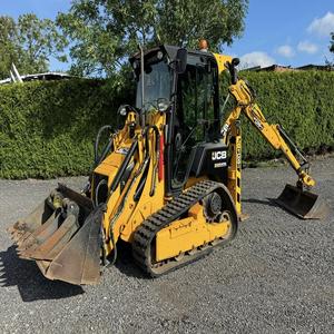 Cargadora frontal de orugas JCB 1CXT-HF usada, minicargadora, retroexcavadora, con capacidad de carga nominal de 4 toneladas y motor Perkins, para uso en terrenos accidentados. - Product Image 2