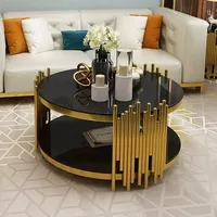 Table basse de salon de luxe ronde en marbre avec un design moderne, table basse ronde créative